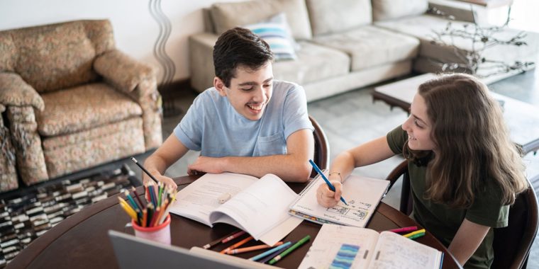 A senior student in a one-to-one mentoring session